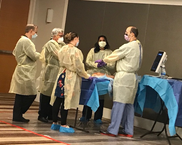 Doctors doing a demonstration of SPRINT PNS